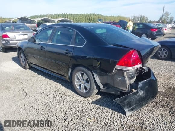 ✅ 2014 Chevrolet Impala LS • VIN: 2G1WA5E33E1140331 • Lot: 43507195. Listed on IAAI with 102,299 mi. Free auction sales archive from the USA and detailed vehicle history report at DreamBid. Image 3.