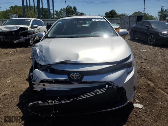 ✅ 2025 Toyota Corolla Hybrid LE • VIN: JTDBDMHE2SJ012412 • Lot: 57169775. Wystawiony na Copart z przebiegiem 2 962 mil. Bezpłatny archiwum sprzedaży aukcyjnych z USA i szczegółowy raport historii pojazdu na DreamBid. Zdjęcie 5.