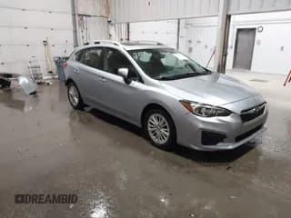 ✅ 2018 Subaru Impreza Premium • VIN: 4S3GTAB63J3728036 • Lot: 43662045. Listed on IAAI with 70,151 mi. Free auction sales archive from the USA and detailed vehicle history report at DreamBid. Image 1.