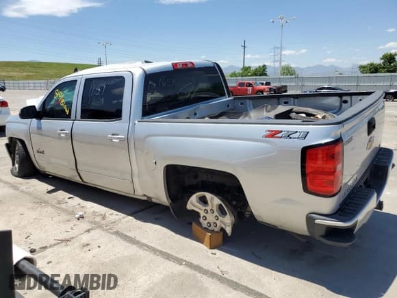 ✅ 2018 Chevrolet Silverado 1500 LT • VIN: 3GCUKREC2JG118874 • Лот: 59123584. Опубликован ранее на Copart с пробегом Не указан. Бесплатный доступ к архиву аукционных продаж из США и подробный отчёт об истории автомобиля на DreamBid. Изображение 2.