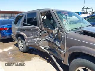 ✅ 2001 Oldsmobile Bravada • VIN: 1GHDT13W012203338 • Lot: 42140817. Listed on IAAI with 174,579 mi. Free auction sales archive from the USA and detailed vehicle history report at DreamBid. Image 6.