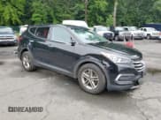 ✅ 2018 Hyundai Santa Fe 2.4L • VIN: 5XYZTDLB9JG569962 • Лот: 66455414. Опубликован ранее на Copart с пробегом 100 231 миль. Бесплатный доступ к архиву аукционных продаж из США и подробный отчёт об истории автомобиля на DreamBid. Изображение 4.