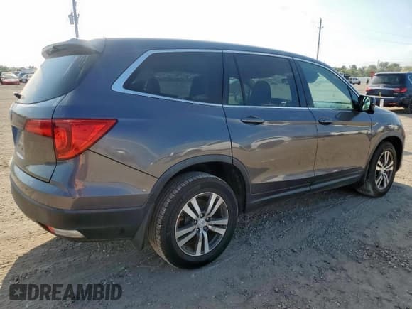 ✅ 2017 Honda Pilot EX-L • VIN: 5FNYF5H50HB036816 • Лот: 80192545. Опубликован ранее на Copart с пробегом 167 448 миль. Бесплатный доступ к архиву аукционных продаж из США и подробный отчёт об истории автомобиля на DreamBid. Изображение 3.