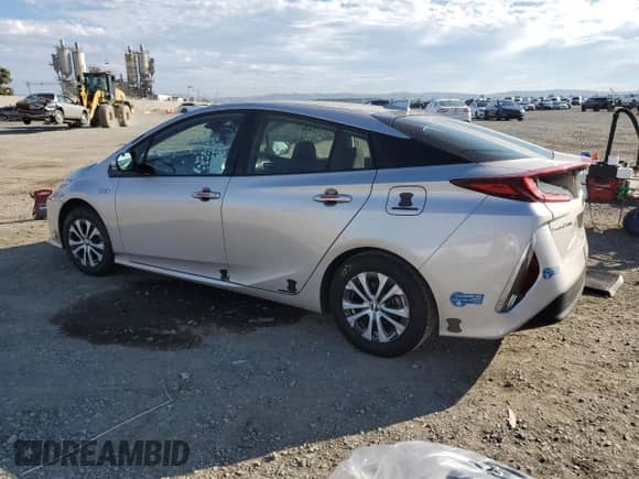 2021 Toyota Prius LE z VIN JTDKAMFP6M3174337, wystawiony jako Copart lot #81413265 z przebiegiem 142 475 mil mil oraz Szkoda całkowita • Salvage title. Historia ofert i sprzedaży dostępna na DreamBid. Obrazek 2.