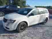 2018 Dodge Journey SE with VIN 3C4PDCABXJT288750, listed as a IAAI auction lot 43500199 with 205,018 mi miles and . Bid and sale history available at DreamBid. Image 2.