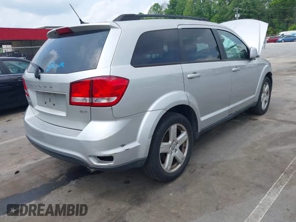 ✅ 2012 Dodge Journey SXT • VIN: 3C4PDCBGXCT324756 • Lot: 42422533. Listed on IAAI with 241,934 mi. Free auction sales archive from the USA and detailed vehicle history report at DreamBid. Image 4.