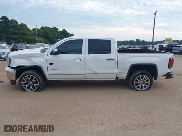 ✅ 2016 GMC Sierra 1500 SLT • VIN: 3GTU2NEC3GG323184 • Lot: 43138901. Listed on IAAI with 122,488 mi. Free auction sales archive from the USA and detailed vehicle history report at DreamBid. Image 15.