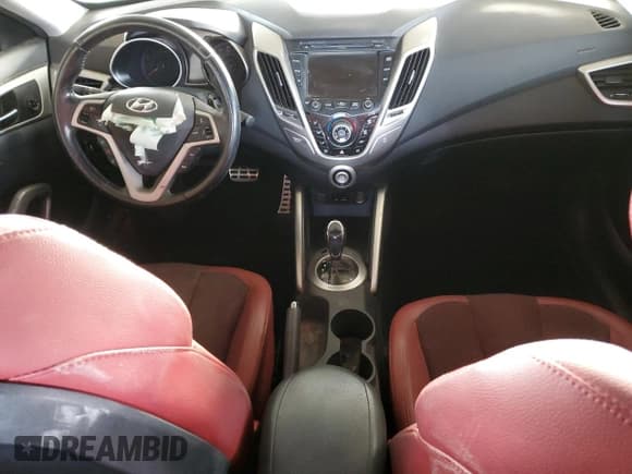 ✅ 2012 Hyundai Veloster w/Red Int • VIN: KMHTC6AD3CU058993 • Lot: 44230704. Wystawiony na Copart z przebiegiem Nie podano. Bezpłatny archiwum sprzedaży aukcyjnych z USA i szczegółowy raport historii pojazdu na DreamBid. Zdjęcie 8.