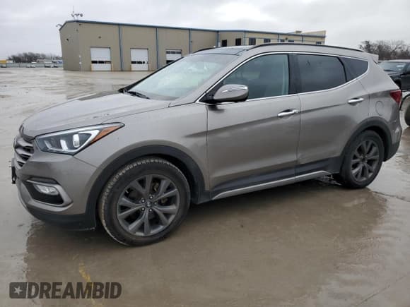 ✅ 2017 Hyundai Santa Fe Ultimate • VIN: 5XYZW4LA9HG457767 • Лот: 39661624. Опубликован ранее на Copart с пробегом 175 724 миль. Бесплатный доступ к архиву аукционных продаж из США и подробный отчёт об истории автомобиля на DreamBid. Изображение 1.