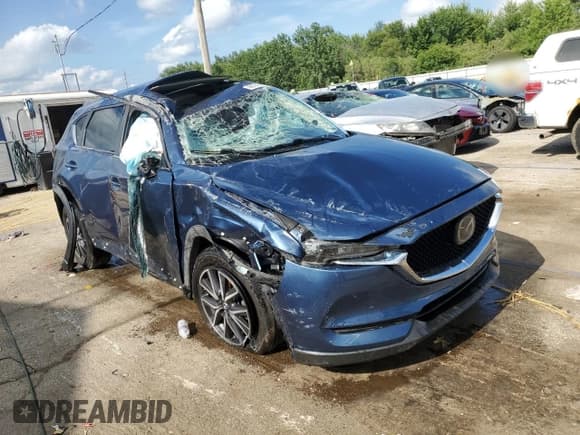 ✅ 2018 Mazda CX-5 Touring • VIN: JM3KFACM5J0419403 • Lot: 66147885. Wystawiony na Copart z przebiegiem Nie podano. Bezpłatny archiwum sprzedaży aukcyjnych z USA i szczegółowy raport historii pojazdu na DreamBid. Zdjęcie 4.
