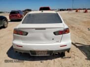 ✅ 2013 Mitsubishi Lancer Evolution MR • VIN: JA32W5FV9DU023927 • Лот: 84158745. Опубликован ранее на Copart с пробегом 72 834 миль. Бесплатный доступ к архиву аукционных продаж из США и подробный отчёт об истории автомобиля на DreamBid. Изображение 6.