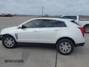 ✅ 2016 Cadillac SRX • VIN: 3GYFNAE31GS580523 • Lot: 41512848. Listed on IAAI with 52,951 mi. Free auction sales archive from the USA and detailed vehicle history report at DreamBid. Image 14.