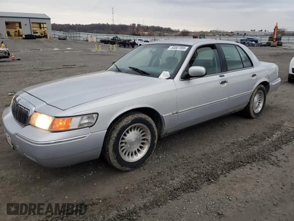 ✅ 2001 Mercury Grand Marquis LS • VIN: 2MEFM75W31X704876 • Лот: 93007895. Опубликован ранее на Copart с пробегом 287 269 миль. Бесплатный доступ к архиву аукционных продаж из США и подробный отчёт об истории автомобиля на DreamBid. Изображение 1.
