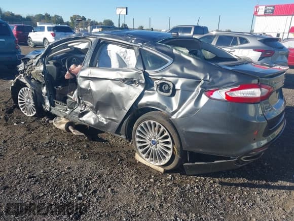 ✅ 2015 Ford Fusion Titanium • VIN: 3FA6P0K95FR115936 • Lot: 43576681. Listed on IAAI with Not provided. Free auction sales archive from the USA and detailed vehicle history report at DreamBid. Image 3.