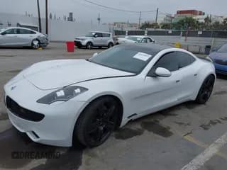 ✅ 2012 Fisker Karma EcoSport • VIN: YH4K14AAXCA000354 • Lot: 42019967. Listed on IAAI with 59,501 mi. Free auction sales archive from the USA and detailed vehicle history report at DreamBid. Image 2.