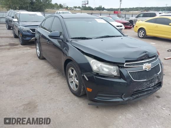 2014 Chevrolet Cruze 1LT with VIN 1G1PC5SB0E7242148, listed as a IAAI auction lot 43401415 with 206,878 mi miles and . Bid and sale history available at DreamBid. Image 1.