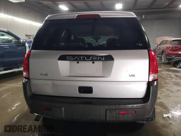 2004 Saturn VUE V6 z VIN 5GZCZ53414S889642, wystawiony jako Copart lot #76753124 z przebiegiem 161 835 mil mil oraz Szkoda całkowita • Salvage title. Historia ofert i sprzedaży dostępna na DreamBid. Obrazek 6.
