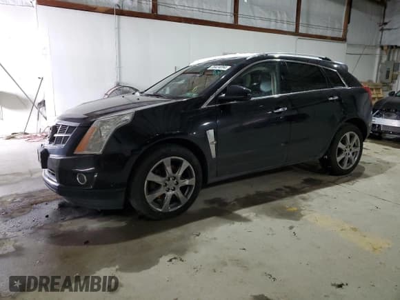 ✅ 2012 Cadillac SRX Premium Collection • VIN: 3GYFNFE31CS653641 • Lot: 38424094. Wystawiony na Copart z przebiegiem 100 677 mil. Bezpłatny archiwum sprzedaży aukcyjnych z USA i szczegółowy raport historii pojazdu na DreamBid. Zdjęcie 1.