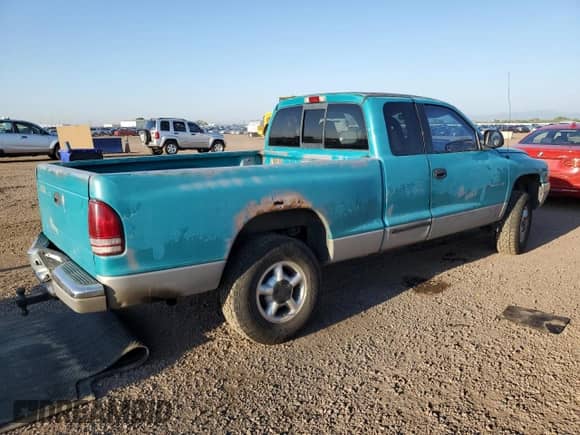 1997 Dodge Dakota with VIN 1B7GG23Y4VS198312, listed as a Copart auction lot 71239045 with 219,002 mi miles and Salvage title. Bid and sale history available at DreamBid. Image 3.