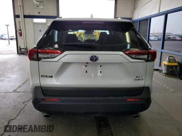 ✅ 2023 Toyota RAV4 Hybrid XLE Premium • VIN: JTMB6RFV4PD542820 • Лот: 84806085. Опубликован ранее на Copart с пробегом 31 306 миль. Бесплатный доступ к архиву аукционных продаж из США и подробный отчёт об истории автомобиля на DreamBid. Изображение 6.