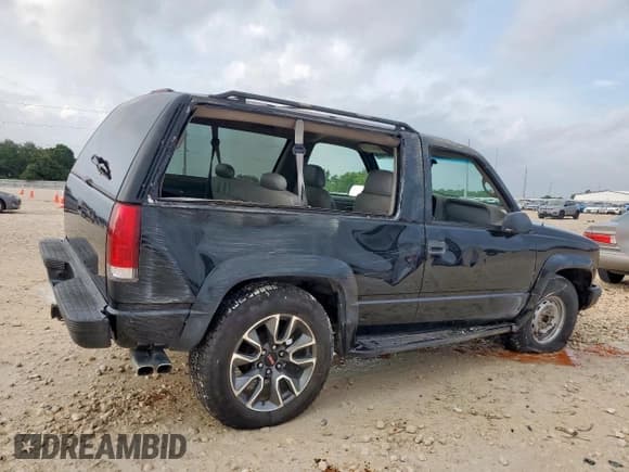 ✅ 1997 GMC Yukon • VIN: 3GKEK18R3VG522671 • Lot: 64501665. Listed on Copart with 169,812 mi. Free auction sales archive from the USA and detailed vehicle history report at DreamBid. Image 3.