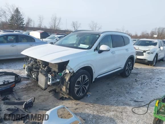 ✅ 2019 Hyundai Santa Fe Limited • VIN: 5NMS5CAA4KH042855 • Лот: 41339966. Опубликован ранее на IAAI с пробегом 89 016 миль. Бесплатный доступ к архиву аукционных продаж из США и подробный отчёт об истории автомобиля на DreamBid. Изображение 2.