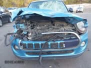 ✅ 2015 MINI Hardtop • VIN: WMWXM5C59FT942625 • Lot: 43552027. Listed on IAAI with 140,338 mi. Free auction sales archive from the USA and detailed vehicle history report at DreamBid. Image 6.