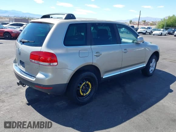 ✅ 2006 Volkswagen Touareg 3.2L V6 • VIN: WVGZG77L66D023081 • Lot: 42712392. Listed on IAAI with 168,774 mi. Free auction sales archive from the USA and detailed vehicle history report at DreamBid. Image 4.