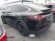 ✅ 2021 Tesla Model X Performance • VIN: 5YJXCBE46MF322680 • Lot: 43535693. Listed on IAAI with 52,241 mi. Free auction sales archive from the USA and detailed vehicle history report at DreamBid. Image 3.