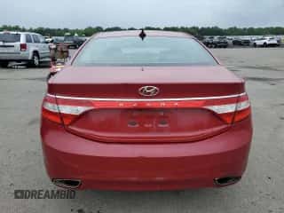 2013 Hyundai Azera z VIN KMHFG4JGXDA227071, wystawiony jako Copart lot #57402424 z przebiegiem 53 424 mil mil oraz Nie do naprawy • Non repairable. Historia ofert i sprzedaży dostępna na DreamBid. Obrazek 6.