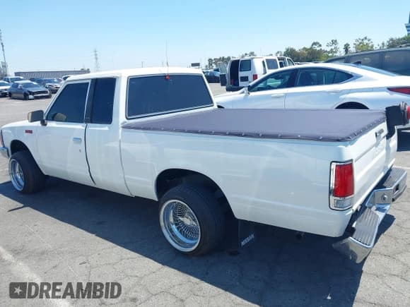 ✅ 1986 Nissan 720 • VIN: JN6ND06S6GW109456 • Lot: 42944828. Wystawiony na IAAI z przebiegiem 137 049 mil. Bezpłatny archiwum sprzedaży aukcyjnych z USA i szczegółowy raport historii pojazdu na DreamBid. Zdjęcie 14.