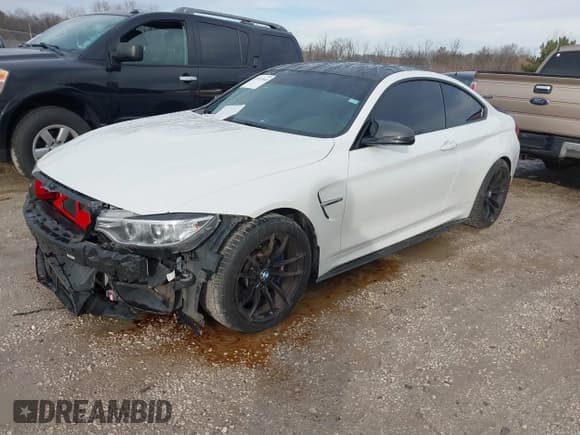 ✅ 2015 BMW M4 • VIN: WBS3R9C52FK334664 • Lot: 43733344. Listed on IAAI with 85,239 mi. Free auction sales archive from the USA and detailed vehicle history report at DreamBid. Image 2.