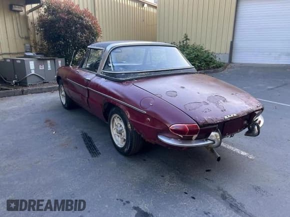 ✅ 1969 Alfa Romeo Spider • VIN: AR1481093 • Lot: 55366765. Listed on Copart with 94,213 mi. Free auction sales archive from the USA and detailed vehicle history report at DreamBid. Image 3.