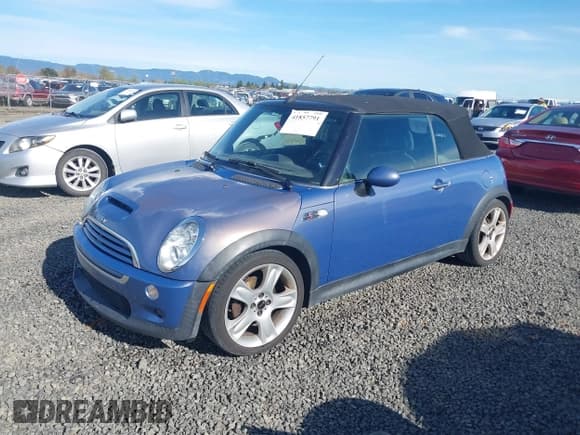 ✅ 2005 MINI Convertible S • VIN: WMWRH33455TF82408 • Lot: 41857791. Listed on IAAI with 133,824 mi. Free auction sales archive from the USA and detailed vehicle history report at DreamBid. Image 2.