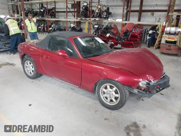 ✅ 2001 Mazda MX-5 Miata • VIN: JM1NB353X10215794 • Lot: 42092359. Listed on IAAI with 121,684 mi. Free auction sales archive from the USA and detailed vehicle history report at DreamBid. Image 1.