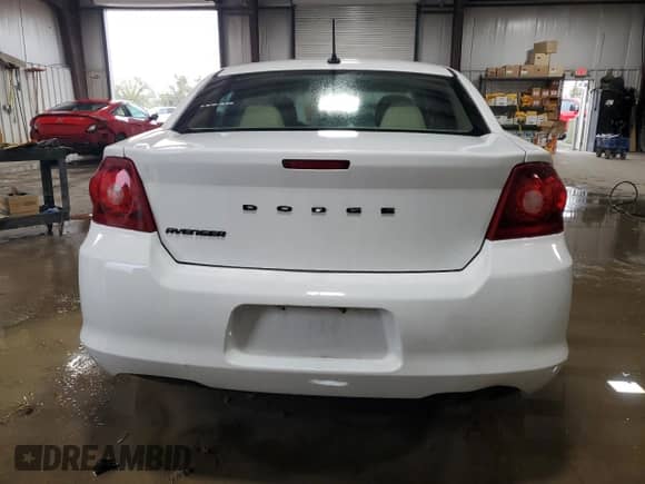 2014 Dodge Avenger SE z VIN 1C3CDZABXEN168717, wystawiony jako Copart lot #73149894 z przebiegiem 121 203 mil mil oraz Szkoda całkowita • Salvage title. Historia ofert i sprzedaży dostępna na DreamBid. Obrazek 6.