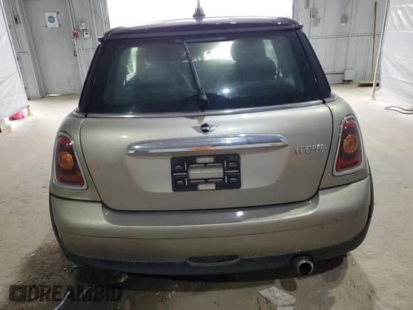 2010 MINI Hardtop with VIN WMWMF3C50ATZ66791, listed as a Copart auction lot 57592875 with Not provided miles and Salvage title. Bid and sale history available at DreamBid. Image 6.