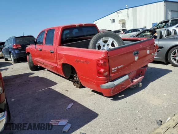 2006 Dodge Dakota SLT с VIN 1D7HE48N76S634016, выставлен на аукционе Copart как лот 54238774 с пробегом 233 035 миль миль и Списание • Salvage title. История ставок и продаж доступна на DreamBid. Изображение 2.