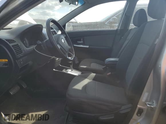 ✅ 2009 Kia Spectra Spectra5 • VIN: KNAFE241195023469 • Lot: 84055165. Listed on Copart with 142,357 mi. Free auction sales archive from the USA and detailed vehicle history report at DreamBid. Image 7.