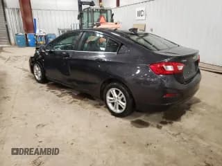 ✅ 2016 Chevrolet Cruze LT • VIN: 1G1BE5SM1G7309686 • Lot: 40006333. Listed on Copart with 127,411 mi. Free auction sales archive from the USA and detailed vehicle history report at DreamBid. Image 2.