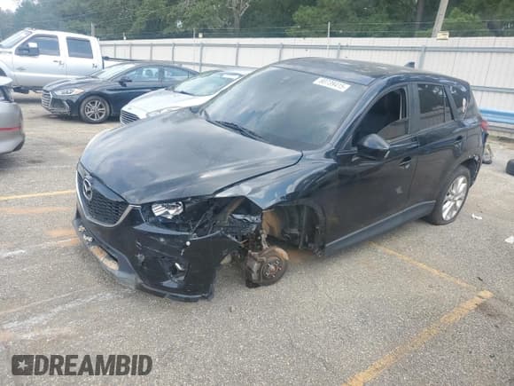 ✅ 2014 Mazda CX-5 Grand Touring • VIN: JM3KE2DY7E0376862 • Lot: 80739415. Listed on Copart with 165,607 mi. Free auction sales archive from the USA and detailed vehicle history report at DreamBid. Image 1.