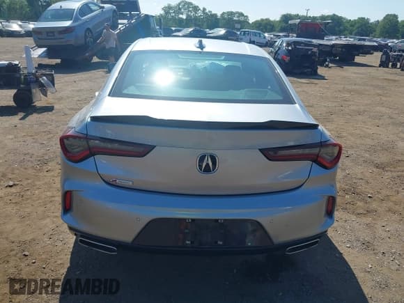 ✅ 2021 Acura TLX w/A-Spec Package • VIN: 19UUB5F52MA008985 • Lot: 42954581. Listed on IAAI with 28,221 mi. Free auction sales archive from the USA and detailed vehicle history report at DreamBid. Image 16.
