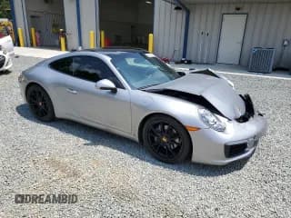 ✅ 2019 Porsche 911 Carrera • VIN: WP0AA2A97KS103238 • Лот: 60938043. Опубликован ранее на Copart с пробегом 29 018 миль. Бесплатный доступ к архиву аукционных продаж из США и подробный отчёт об истории автомобиля на DreamBid. Изображение 4.