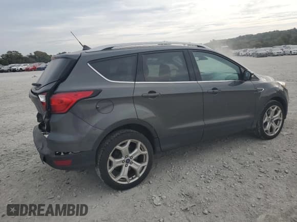 ✅ 2019 Ford Escape Titanium • VIN: 1FMCU0J98KUC29404 • Lot: 86508375. Listed on Copart with 91,529 mi. Free auction sales archive from the USA and detailed vehicle history report at DreamBid. Image 3.