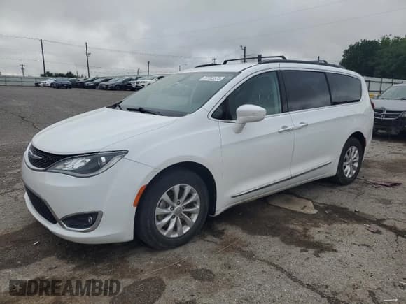 ✅ 2017 Chrysler Pacifica Touring L • VIN: 2C4RC1BG1HR702473 • Лот: 57705575. Опубликован ранее на Copart с пробегом 152 445 миль. Бесплатный доступ к архиву аукционных продаж из США и подробный отчёт об истории автомобиля на DreamBid. Изображение 1.