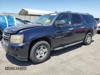 2007 Chevrolet Suburban LS с VIN 1GNFC160X7J180517, выставлен на аукционе Copart как лот 63933475 с пробегом Не указан миль и Чистый • Clean title. История ставок и продаж доступна на DreamBid. Изображение 1.