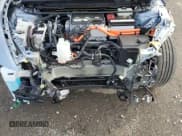 ✅ 2023 Lexus RZ 450e Premium • VIN: JTJAAAAB0PA011699 • Lot: 65108714. Listed on Copart with 12,365 mi. Free auction sales archive from the USA and detailed vehicle history report at DreamBid. Image 12.