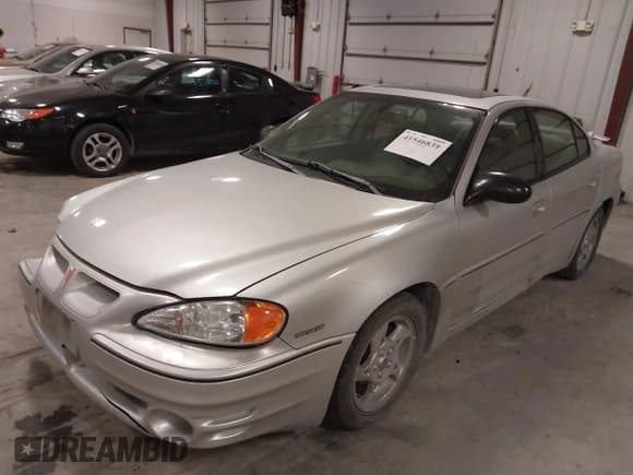 ✅ 2003 Pontiac Grand Am GT • VIN: 1G2NW52E93M605453 • Lot: 41546839. Listed on IAAI with 202,918 mi. Free auction sales archive from the USA and detailed vehicle history report at DreamBid. Image 2.