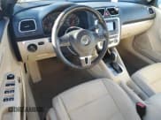 ✅ 2014 Volkswagen Eos Komfort • VIN: WVWBW8AH2EV000733 • Лот: 82770925. Опубликован ранее на Copart с пробегом 139 754 миль. Бесплатный доступ к архиву аукционных продаж из США и подробный отчёт об истории автомобиля на DreamBid. Изображение 8.