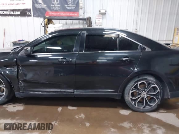 ✅ 2015 Ford Taurus SHO • VIN: 1FAHP2KT6FG137418 • Лот: 42256452. Опубликован ранее на IAAI с пробегом 140 335 миль. Бесплатный доступ к архиву аукционных продаж из США и подробный отчёт об истории автомобиля на DreamBid. Изображение 14.